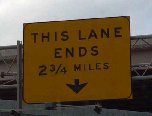 This-lane-ends-sign